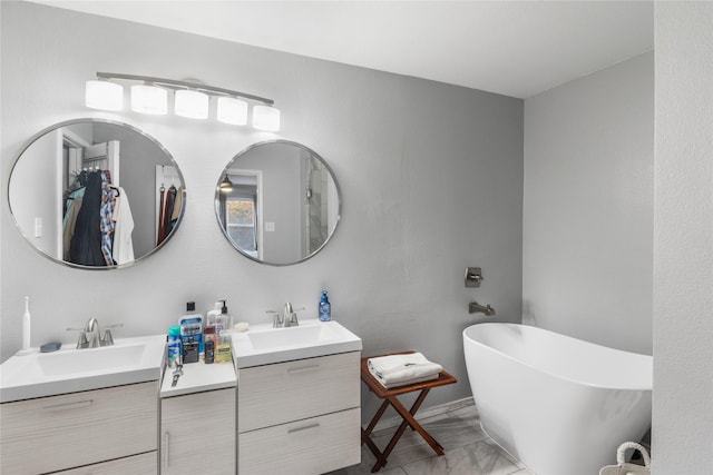 bathroom featuring vanity and a bathtub