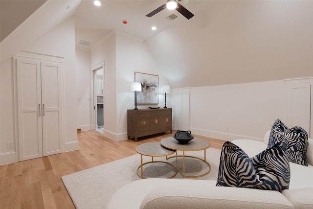 sitting room featuring crown molding, ceiling fan, vaulted ceiling, and light hardwood / wood-style flooring