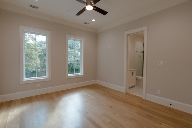 unfurnished room with ceiling fan, ornamental molding, and light hardwood / wood-style floors