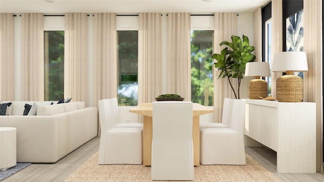 dining area with light wood-type flooring