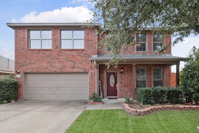 view of front facade with a garage and a front yard