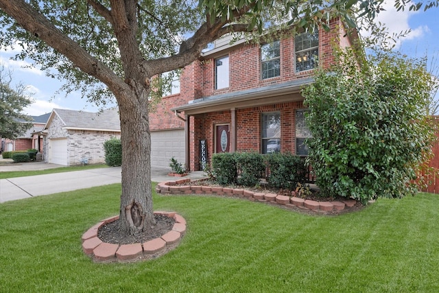 view of front of property with a garage and a front lawn