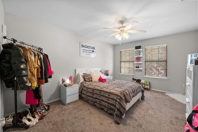 bedroom featuring ceiling fan and light colored carpet