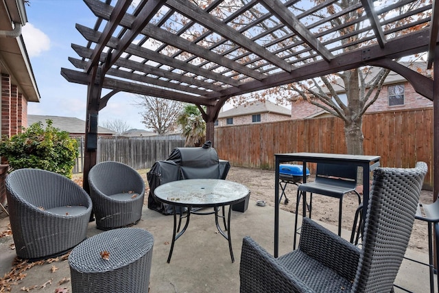 view of patio with central AC and a pergola