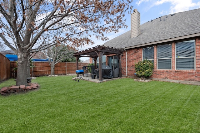 view of yard with a patio area and a pergola