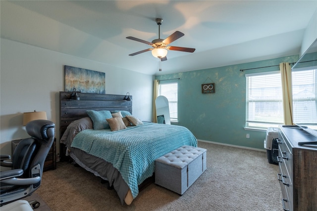 bedroom with light colored carpet and ceiling fan