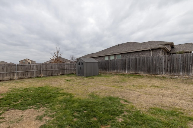 view of yard with a storage shed