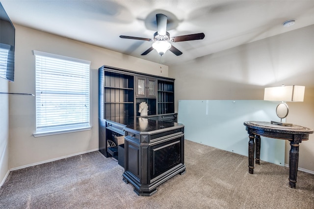 home office featuring ceiling fan and carpet flooring