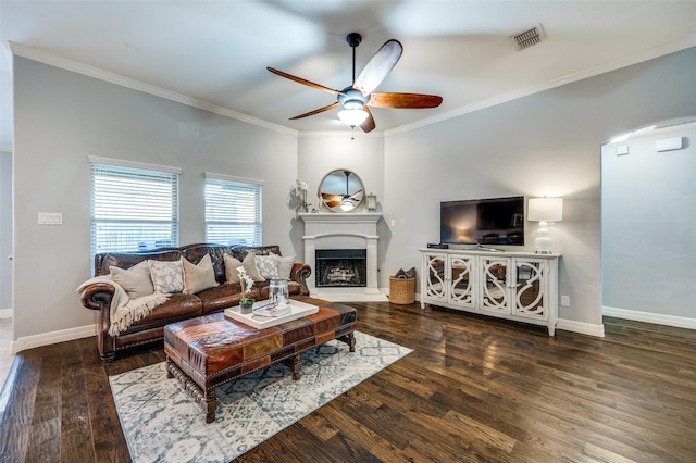 living room featuring ornamental molding, ceiling fan, and dark hardwood / wood-style flooring