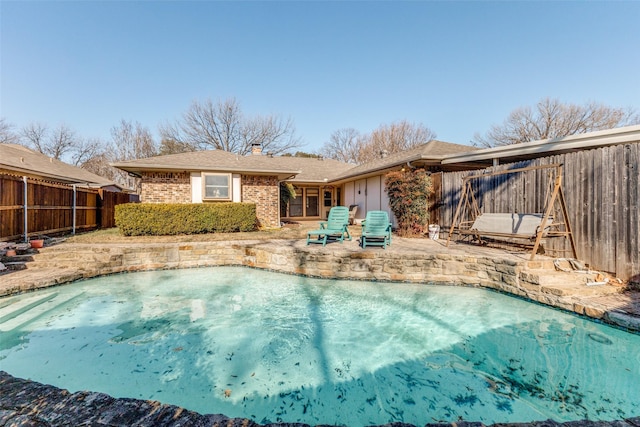 view of pool with a patio