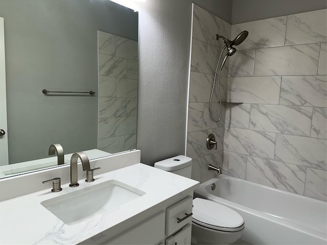 bathroom featuring shower / bathtub combination, a textured wall, toilet, and vanity