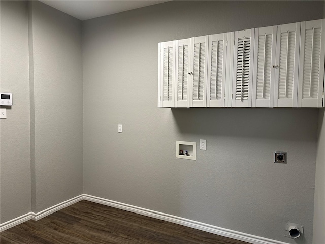 laundry area with washer hookup, cabinet space, electric dryer hookup, and baseboards