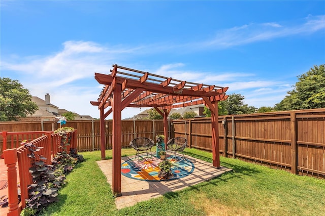 view of yard with a pergola and a patio area