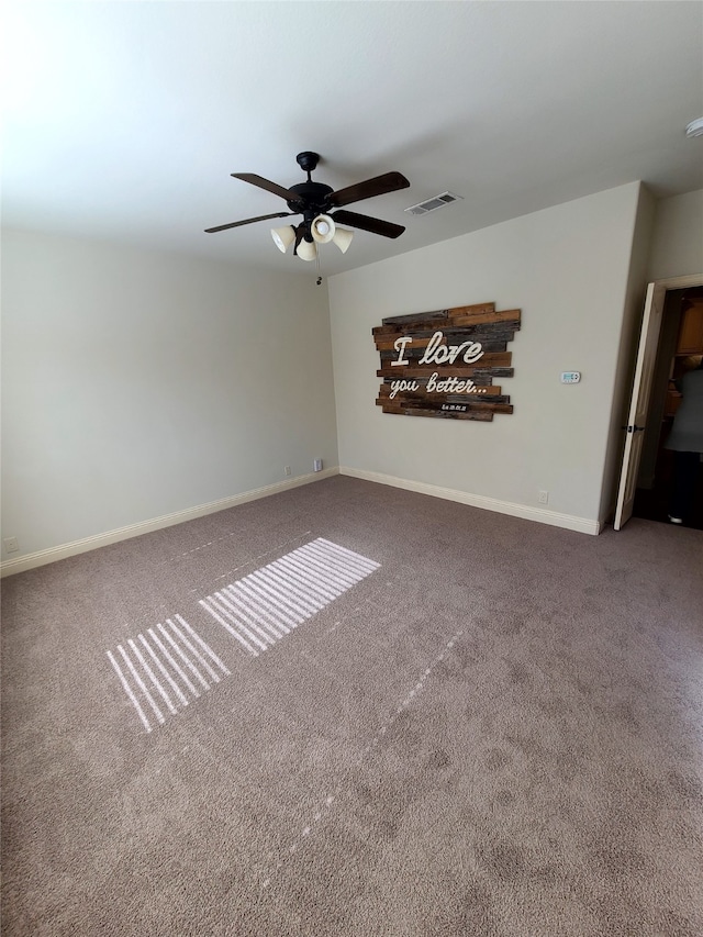 carpeted empty room with ceiling fan