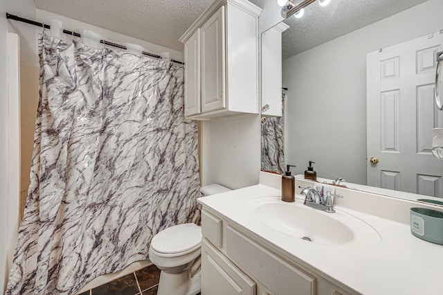 bathroom featuring vanity, curtained shower, a textured ceiling, and toilet