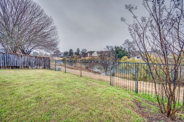 view of yard with a water view