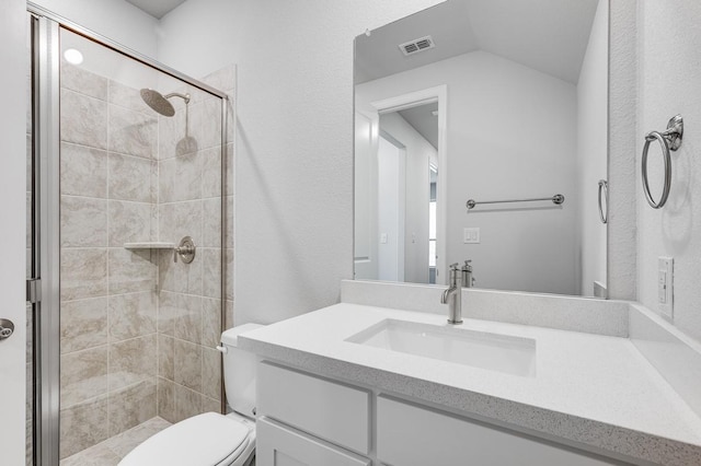 1533 Ginger Ln, Argyle, TX 76226 - bathroom with a stall shower, vanity, toilet, and lofted ceiling