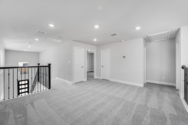 1533 Ginger Ln, Argyle, TX 76226 - empty room featuring attic access, light carpet, recessed lighting, and baseboards
