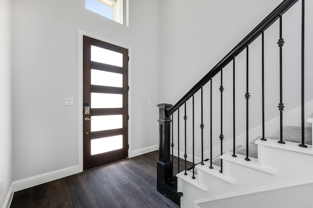 1533 Ginger Ln, Argyle, TX 76226 - foyer entrance featuring stairs, dark wood-style floors, baseboards, and a high ceiling