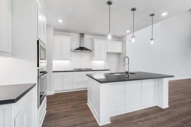 1533 Ginger Ln, Argyle, TX 76226 - kitchen with wall chimney exhaust hood, a sink, dark countertops, appliances with stainless steel finishes, and recessed lighting