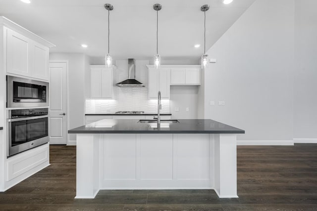 1533 Ginger Ln, Argyle, TX 76226 - kitchen with stainless steel appliances, wall chimney exhaust hood, a sink, dark countertops, and recessed lighting