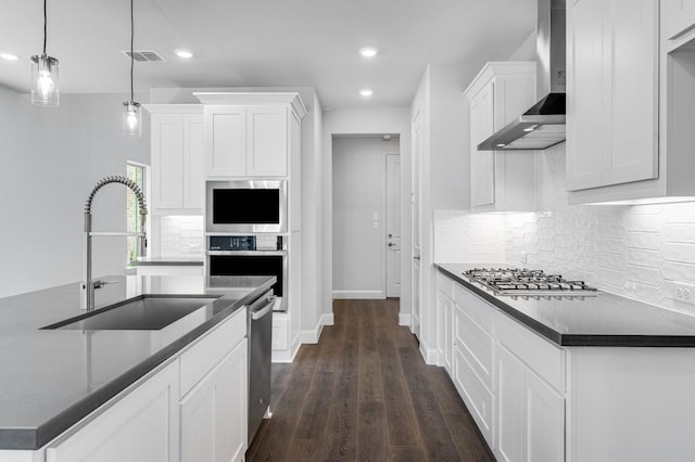 1533 Ginger Ln, Argyle, TX 76226 - kitchen featuring wall chimney exhaust hood, a sink, stainless steel appliances, recessed lighting, and dark wood finished floors