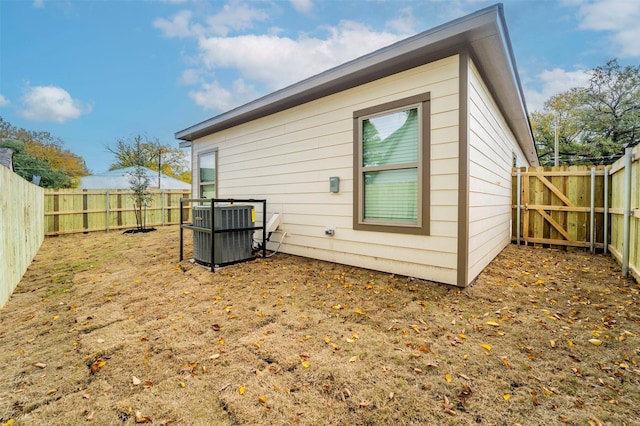 back of property with central air condition unit