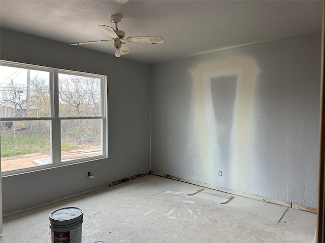 spare room with ceiling fan