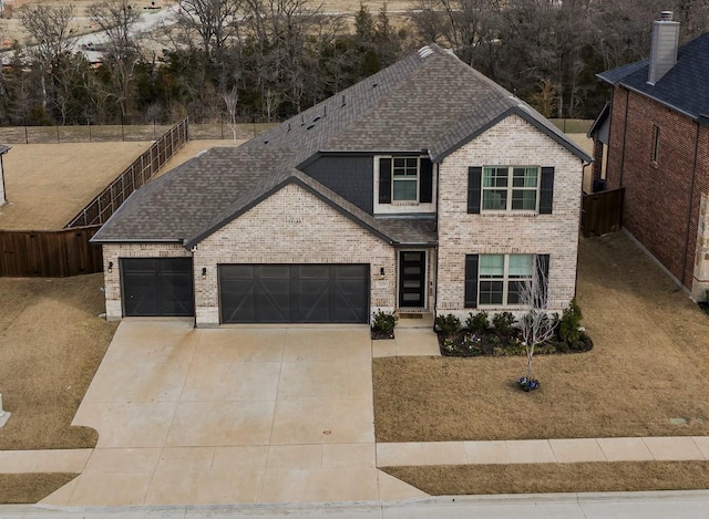 3124 Creek Meadow Dr, Anna, TX 75409 - traditional-style home with driveway, roof with shingles, an attached garage, fence, and brick siding