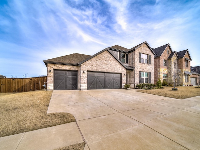 3124 Creek Meadow Dr, Anna, TX 75409 - view of front of house with a garage, driveway, fence, and brick siding