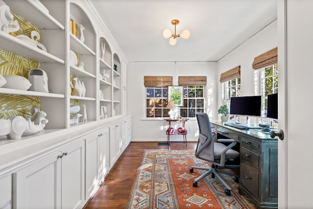 office space with dark hardwood / wood-style flooring and a chandelier