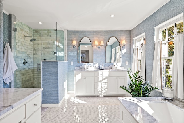 bathroom featuring tile patterned floors, vanity, and independent shower and bath