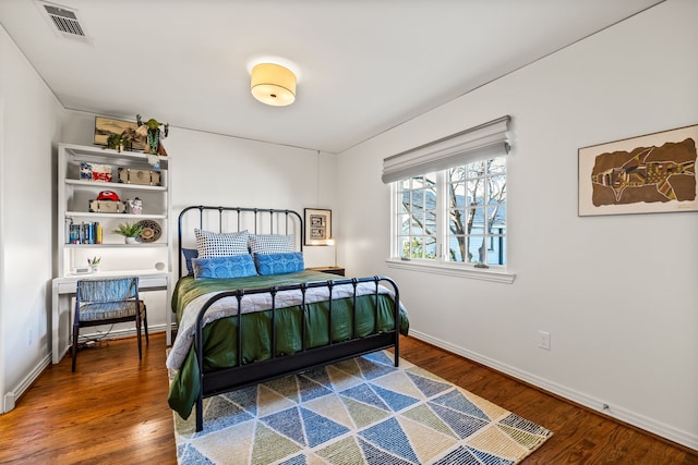 bedroom featuring hardwood / wood-style floors