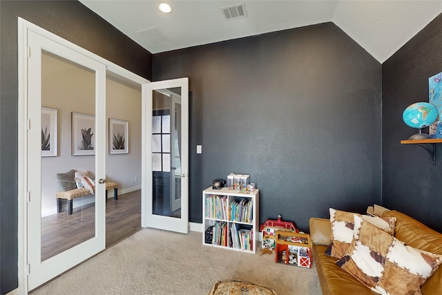 playroom with french doors, lofted ceiling, and carpet flooring