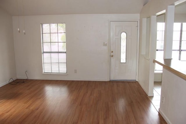 9514 Zelkova Cir, Dallas, TX 75249 - entrance foyer with baseboards and light wood-type flooring