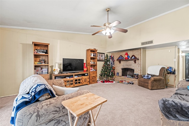 living room featuring lofted ceiling, ornamental molding, a brick fireplace, and carpet