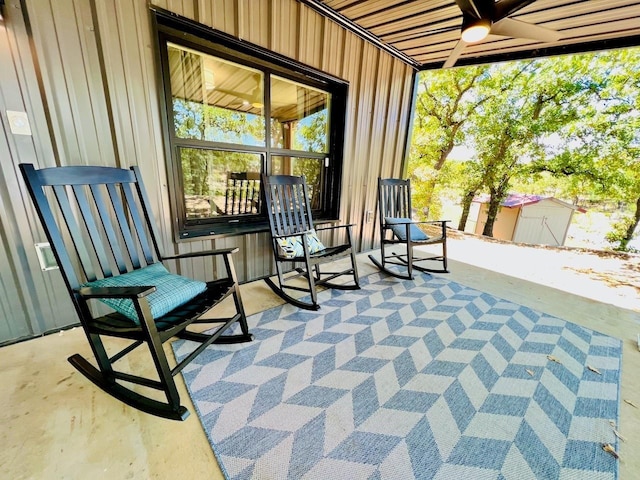 view of patio featuring ceiling fan