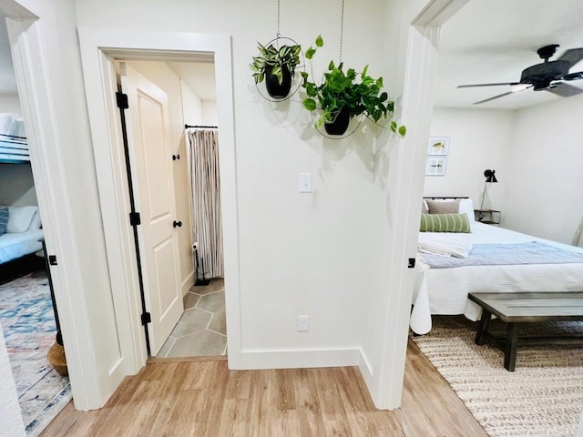 bedroom with light wood-type flooring