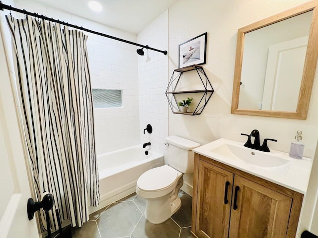 full bathroom with vanity, toilet, tile patterned flooring, and shower / bath combo