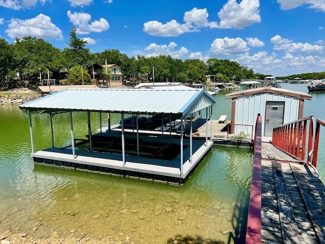 dock area with a water view