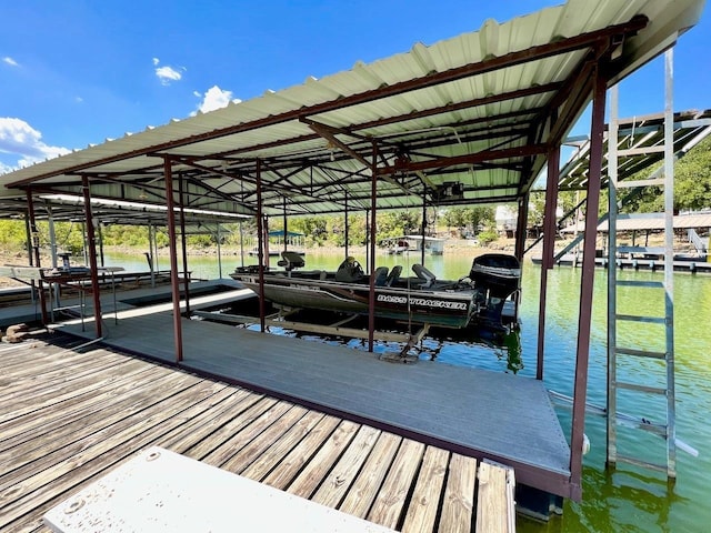 dock area with a water view