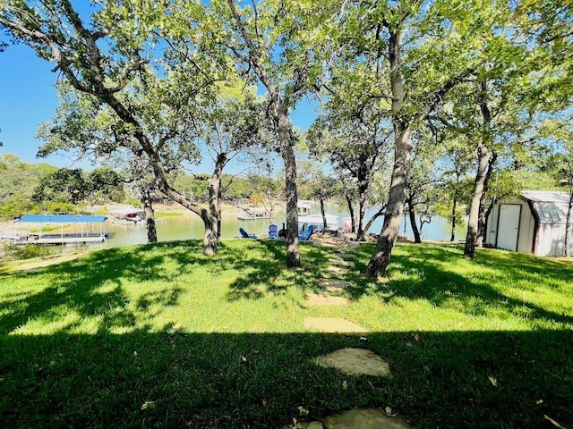 view of yard with a water view