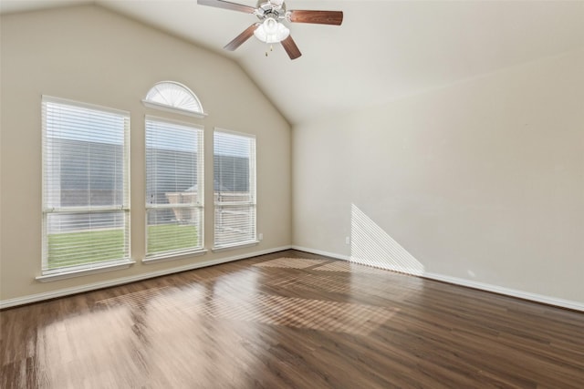 unfurnished room with wood-type flooring, lofted ceiling, and ceiling fan