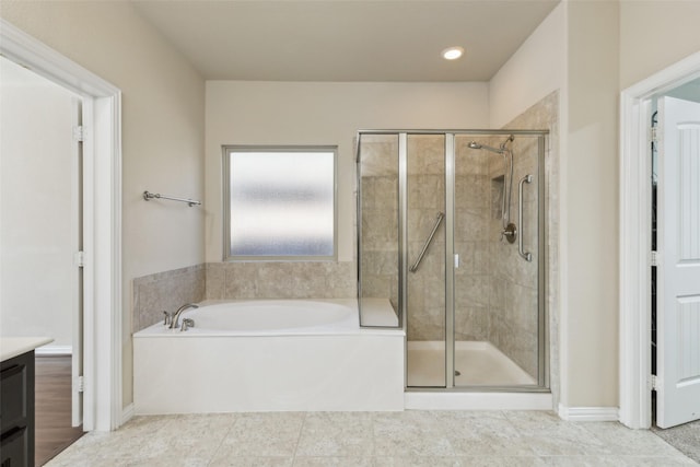 bathroom with vanity, tile patterned flooring, and separate shower and tub