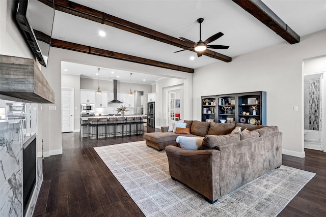 7400 E Fork Ln, Mckinney, TX 75071 - living area featuring beamed ceiling, ceiling fan, a fireplace, recessed lighting, and dark wood-style flooring
