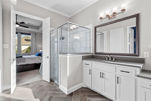 7400 E Fork Ln, Mckinney, TX 75071 - bathroom featuring a stall shower, vanity, ensuite bathroom, ornamental molding, and baseboards