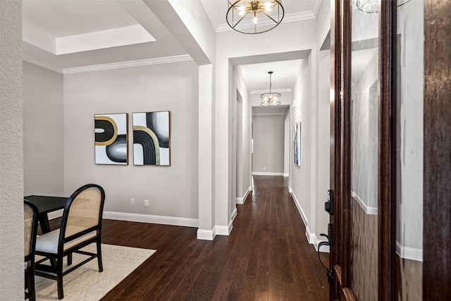 7400 E Fork Ln, Mckinney, TX 75071 - hall with a chandelier, dark wood-style floors, baseboards, and crown molding