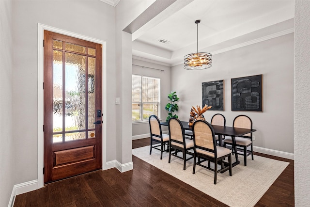 7400 E Fork Ln, Mckinney, TX 75071 - entrance foyer featuring dark wood-style floors, a chandelier, baseboards, and crown molding