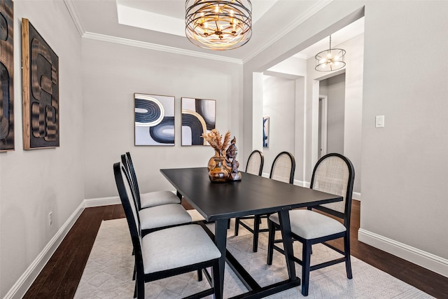 7400 E Fork Ln, Mckinney, TX 75071 - dining room with a chandelier, wood finished floors, baseboards, and ornamental molding