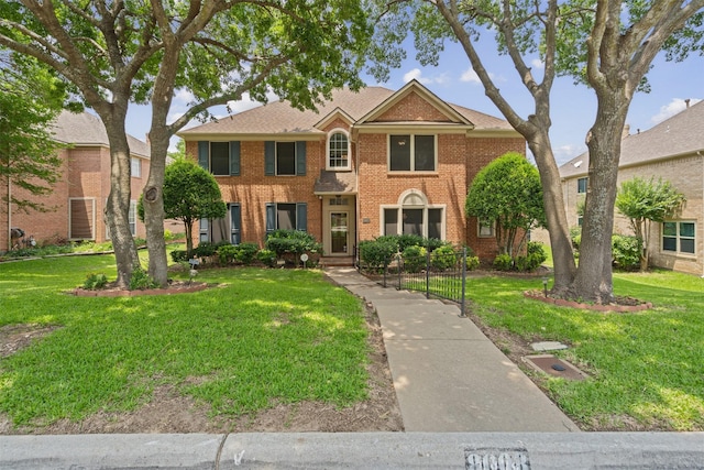 view of front of home featuring a front lawn